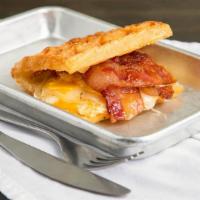 Breakfast Sammy · Croissant waffle  sandwich with over medium eggs, provolone cheese, special sauce and choice...