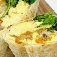 Workout Reward Burrito · flour tortilla rolled up + stuffed with 2 eggs, tater tots, avocado, caramelized onions, mus...