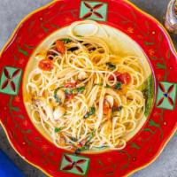 Spaghetti Aglio E Olio · Traditional Italian pasta dish from Naples, sauteed garlic in olive oil, red chili flakes, a...