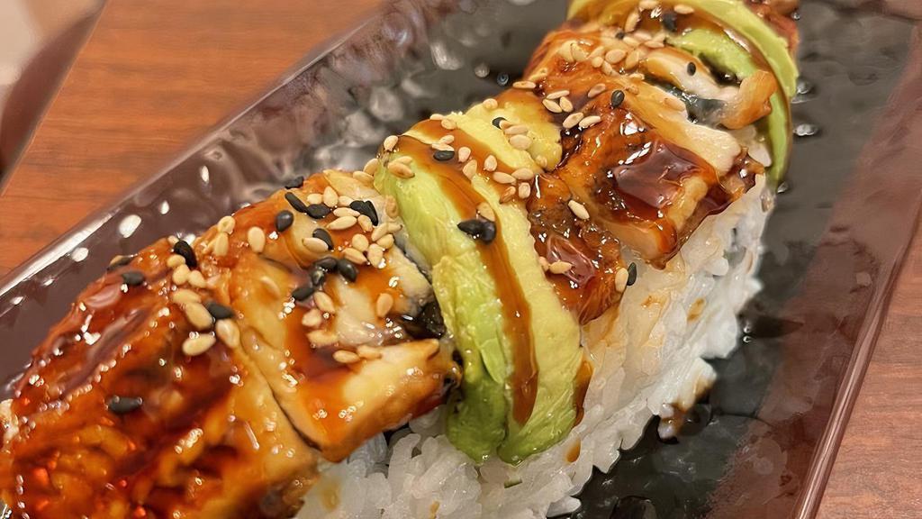 Dragon Roll · California roll, topped with eel, avocado, and eel sauce.