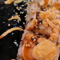 T. Roll · Spicy tuna, shrimp tempura, topped with seared albacore with crispy onions, eel sauce, and c...