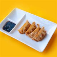 Fried Pork Potstickers · 4PCS // pork + vegetable dumplings / topped with sesame seeds / side dipping sauce