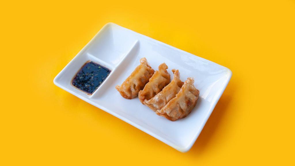 Fried Pork Potstickers · 4PCS // pork + vegetable dumplings / topped with sesame seeds / side dipping sauce