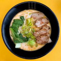 Fat Duck Ramen · creamy tonkotsu broth // topped with duck chashu, bok choy, fried garlic, sesame seeds, scal...