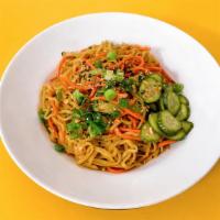 Veggie Pan-Fried Noodles · broccoli, carrot, fried-garlic, pickled cucumber, scallions, zucchini / topped with black se...