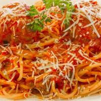 Spaghetti Con Polpette · Homemade meatballs.