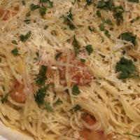 Spaghetti Con Pomodoro · Fresh tomato, basil, garlic, and extra virgin olive oil.