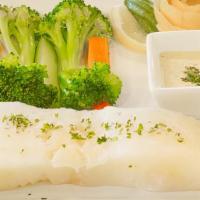 Chilean Sea Bass · Poached in a white wine broth and spices. Covered with dijon mustard, capers, and cream sauc...