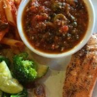 Loch Duart Fresh Salmon Filet · Served Livornese style with capers, olives, and fresh tomato topping. Served with a medley o...