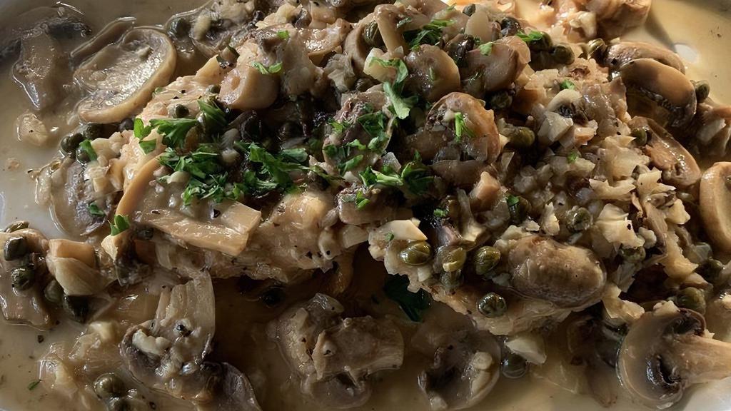 Pollo Piccata · Sautéed chicken breast in mushrooms, capers, lemon and topped with white wine reduction.