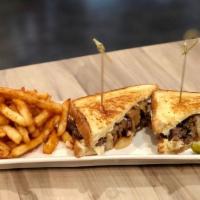 Patty Melt · Black angus patty, cheese with grilled onion on sourdough.