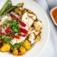 Chicken Tikka Masala Bowl · Artful combination of house made basmati rice, chicken, dairy free tikka masala sauce, green...