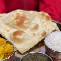 Vegetarian Thali · Two vegetarian choices :- saag paneer, shahi paneer, aloo gobi, chana masala, aloo matter an...