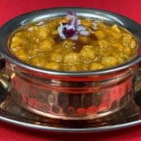 Chana Masala · Vegan, gluten-free. Indian chickpeas prepared in the Northern Indian style with onion, ginge...