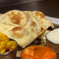 Curry Thali · Choice of one: chicken curry, chicken tikka masala, lamb tikka masala or lamb curry.