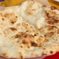 Naan · Classic leavened bread made with white flour.