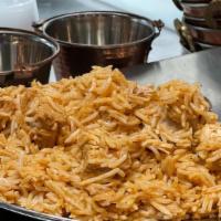 Dum Lamb Biryani · Long grain basmati rice cooked in a sealed pot layered with Lamb  and flavored with aromatic...