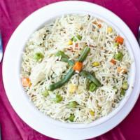 Rice Of The Day · Basmati rice prepared with the chef's selection of vegetables. Made fresh daily.