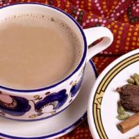 Masala Chai · Traditional tea of India, brewed with milk, ginger and cardamom and a special blend of spices.