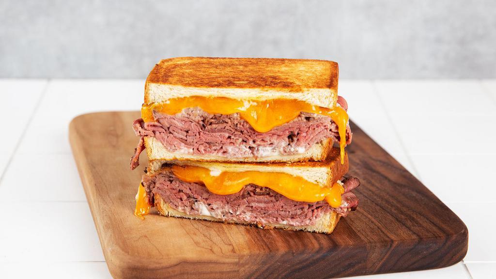 Roast Beef Melt · Griddled sandwich with roast beef, melty yellow cheddar, and your choice of bread.