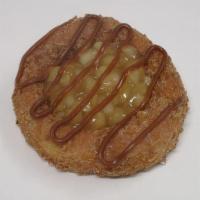 Dutch Caramel Apple · Raised yeast donut coated in crumb, topped with apple.