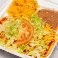 One Enchilada · Beef, chicken or cheese and onion enchilada and one taco hard or soft shell, ground beef or ...