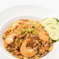 Tay Ho Fried Rice · Vietnamese ham, eggs, peas and carrots, lap xuong sausage, shrimp, garlic, green onions, and...