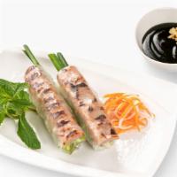 Spring Rolls - Grilled Pork Sausage (3) · Grilled pork sausage with vermicelli and fresh herbs wrapped in rice paper w/ our Orange dip...