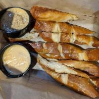 Giant Pretzel · Served with house-made beer cheese and brewer's mustard.