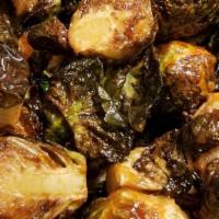 Brussels Sprouts · Tossed in a sweet and tangy glaze.
