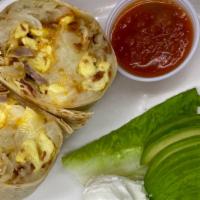 Breakfast Burrito · 3 scrambled eggs, bacon, sausage, hash browns, Jack and cheddar cheese in a flour tortilla w...