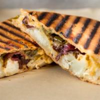 Golden Panini · Roasted garlic golden potatoes, housemade garlic/mustard aioli, grilled bell peppers, onions...
