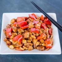 Kung Pao Chicken · Dark meat chicken with red bell peppers, peanuts and water chestnuts in a spicy red sauce. H...