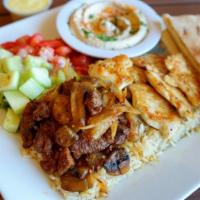 Meat Combo · Choose a combination of any two meats. Served with salad, hummus, pita bread, and choice of ...