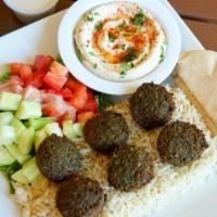 Falafel Plate · Vegetarian favorite. A mixture of garbanzo beans, vegetables, and spices cooked in canola oi...