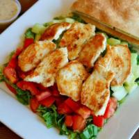 Grilled Chicken Salad · Green salad topped with 8 oz. of chicken.