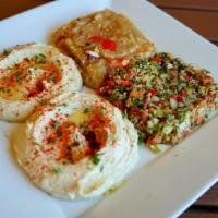 Salad Combo · Hummus, tabbouleh, baba ghanoush, Dolma and two pitas.