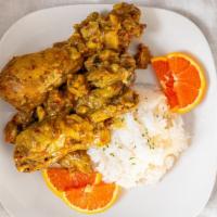 Curry Chicken · Curry chicken served with Jasmine rice.