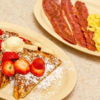 French Toast, Eggs & Meat · 4 French Toast halves with 2 eggs and choice of meat.