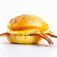 The O.G.* · choice of smoked bacon or breakfast sausage, fried egg, cheddar, english style muffin