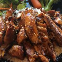 Teriyaki Chicken Plate · Tender slices of grilled chicken marinated with our house teriyaki sauce. Served with white ...