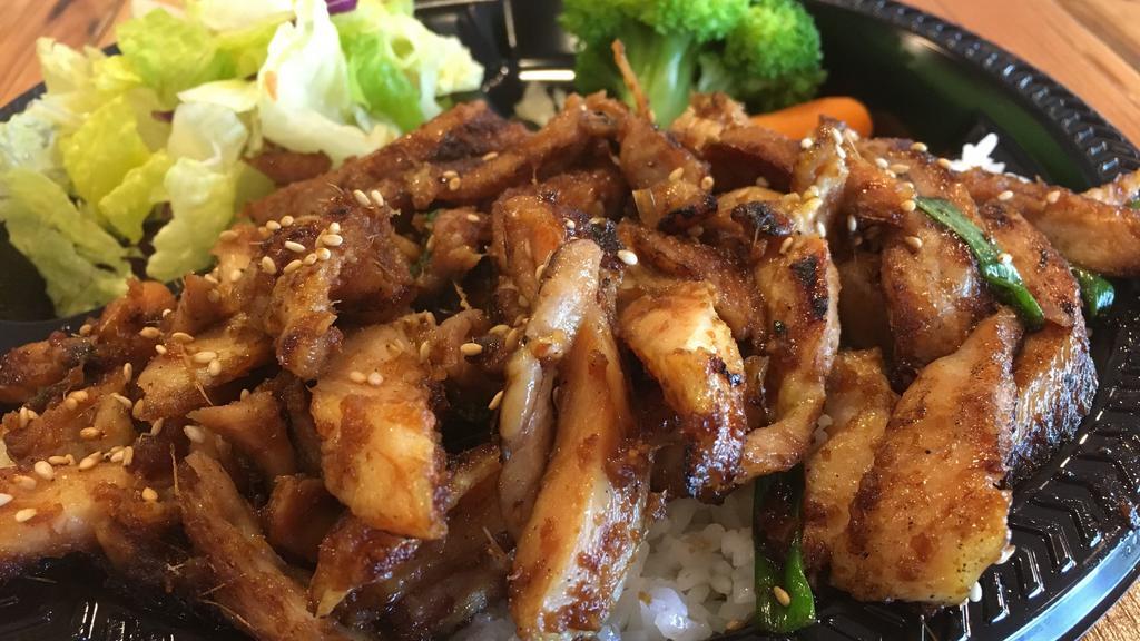 Ginger Chicken Plate · A delightful twist on the classic chicken plate, tender stir-fried grilled chicken is marinated with our house ginger sauce and green onion. Served with white rice and side salad.