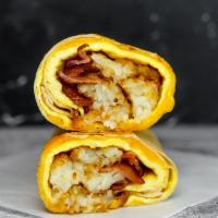 Bacon, Egg & Cheddar Breakfast Burrito · 3 fresh cracked, cage-free scrambled eggs, melted Cheddar cheese, smokey bacon, and crispy p...