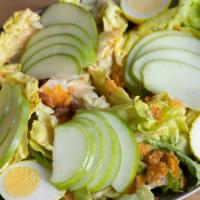 Butter Lettuce Salad · Pickled egg, crispy cheddar, smoked almonds, apple, creamy mustard dressing.