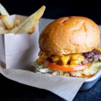 So Cal Double Cheeseburger · Two smash patties, Americanized cheese, lettuce, tomato, come back sauce. Regular Fries incl...
