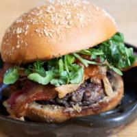 Bleuprint Burger · Smoked bleu cheese, pig candy, fried onions, roasted garlic steak sauce, peppercress. Regula...