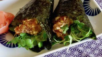 Spicy Tuna Hand Roll · Top grade tuna +7 spices, sushi rice, cucumber.