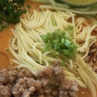 Dan Dan Noodles · Traditional Sichuan style noodles with homemade mildly-spiced sesame peanut sauce. Served wi...