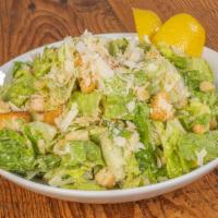 Caesar Salad · Crisp romaine lettuce, parmesan cheese, and croutons with Caesar dressing