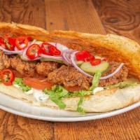 Pedro Po'Boy · Battered and fried. Served on Garlic bread with shredded lettuce, tomato, dill pickles, pick...
